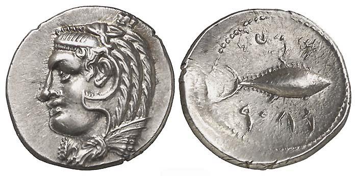Imagen de sendas caras de una moneda púnica en la que se observa un atún.